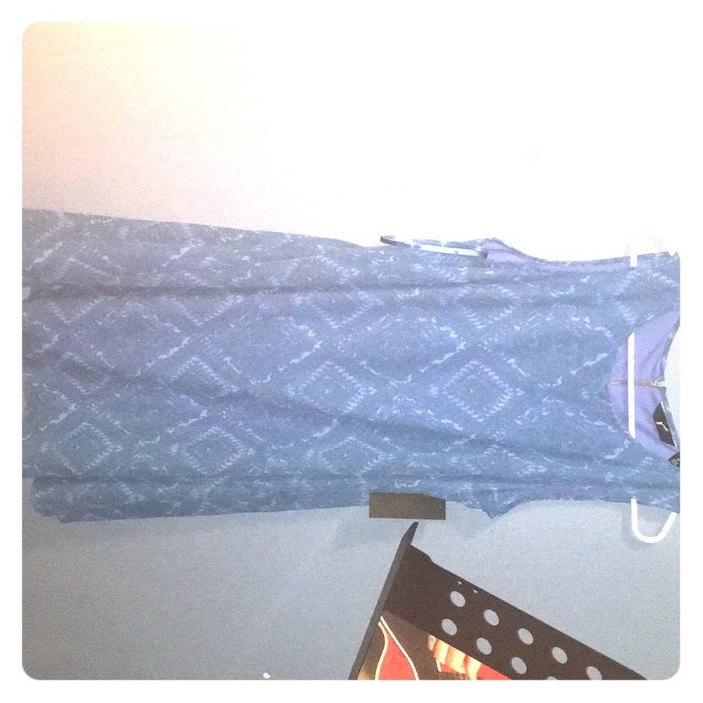 Mid length flowing blue rhombus dress